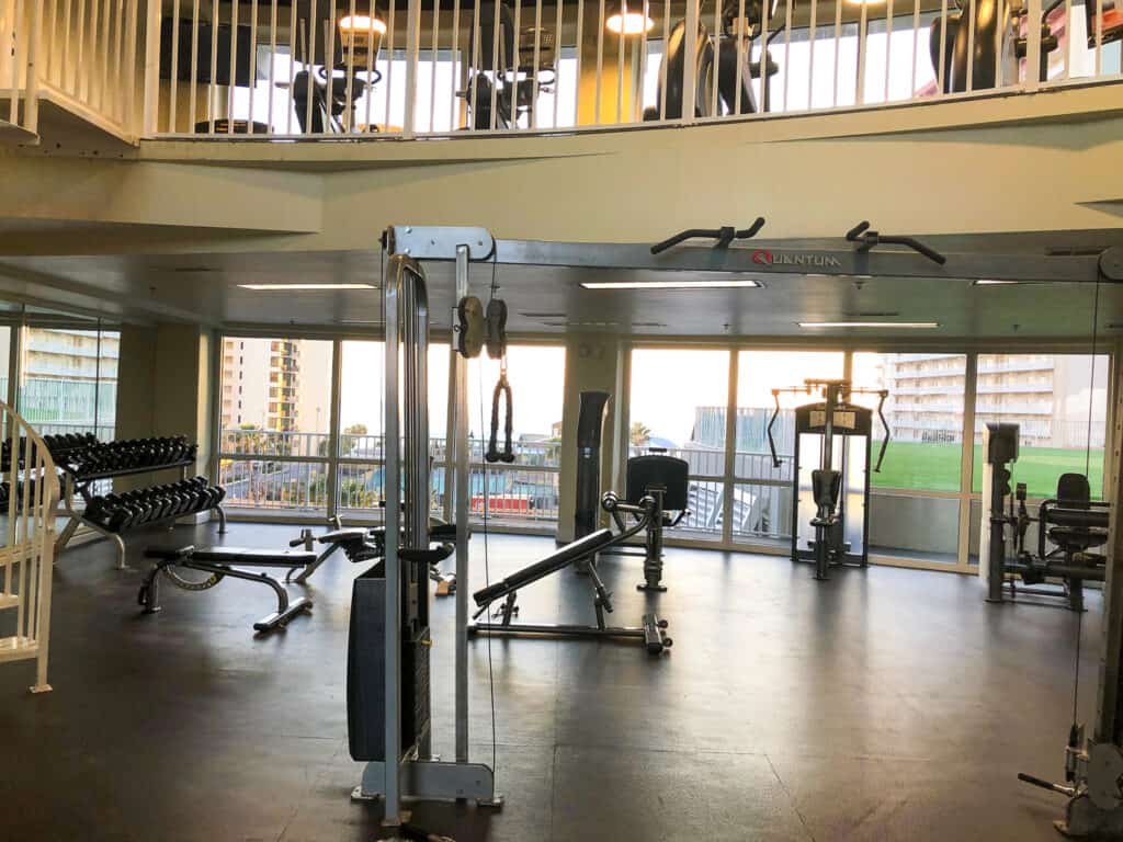 A wide view of the two-floor fitness center at Laketown Wharf