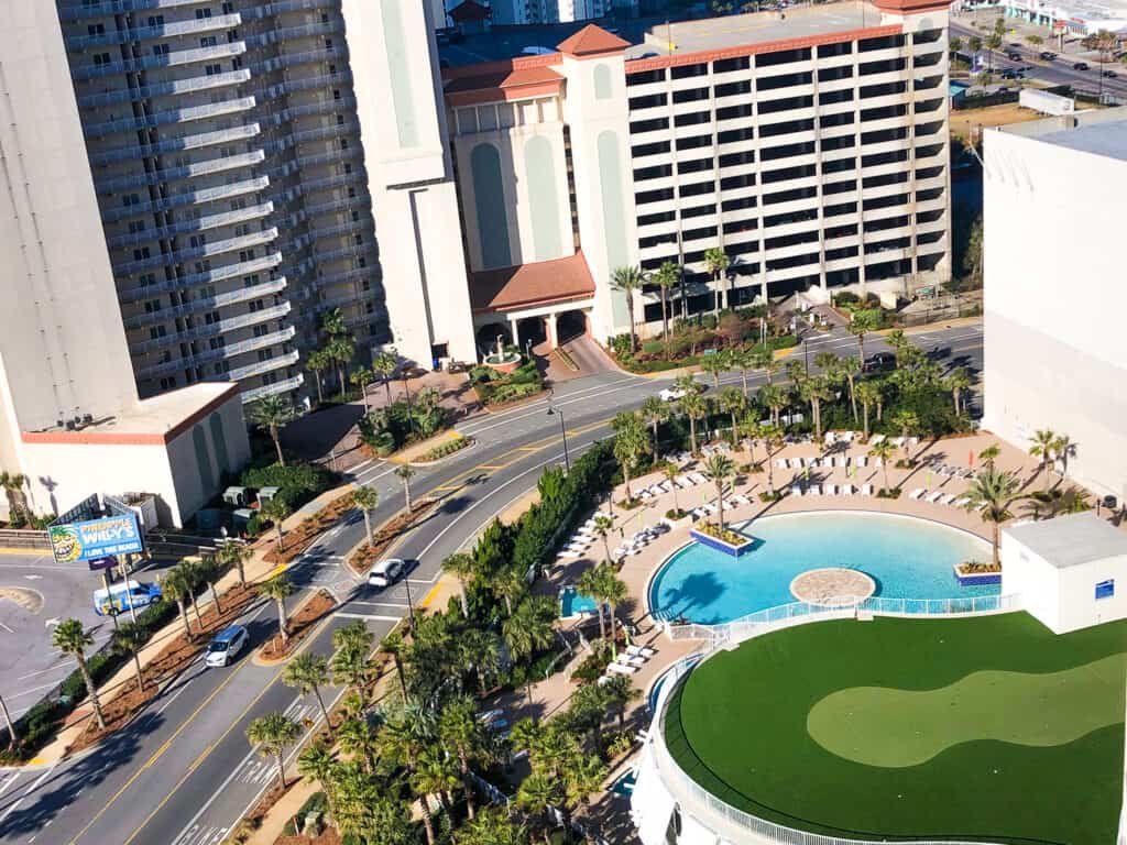 View of Laketown Wharf from the balcony showing the main pool and putting green